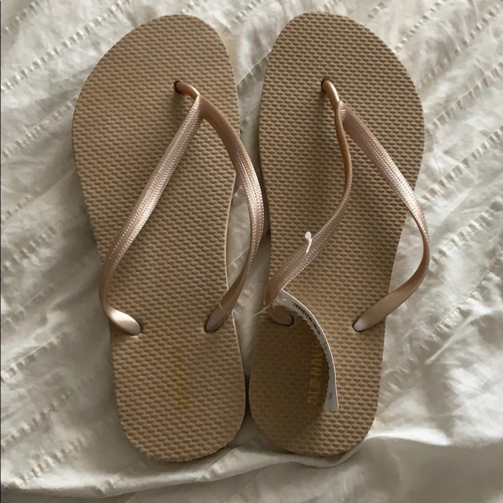 Gold flip flops